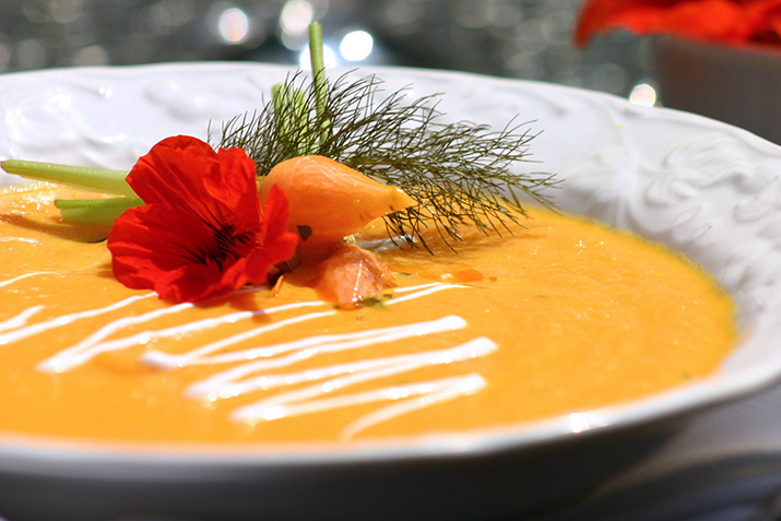 https://www.grocery.coop/sites/default/files/Creamy_Carrot_and_Coconut_Milk_Soup_with_Thai_Red_Curry.jpg