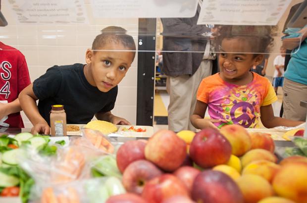 Food Co-ops Dig in to Support Farm to School Programs - Child in Maryland Cafeteria