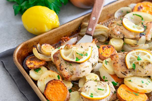 Roasted chicken with root vegetables on a sheet pan