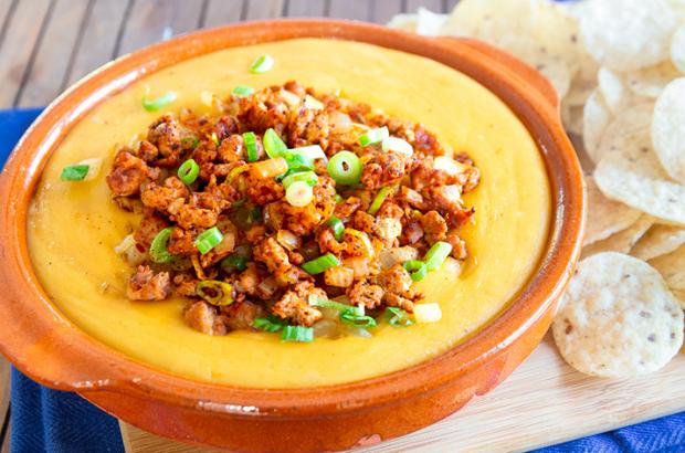 Mexican cheese dip with sausage in a bowl