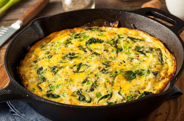 Spinach and feta frittata in a cast iron skillet