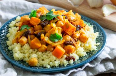 Moroccan Vegetable Tagine with Chickpeas atop couscous