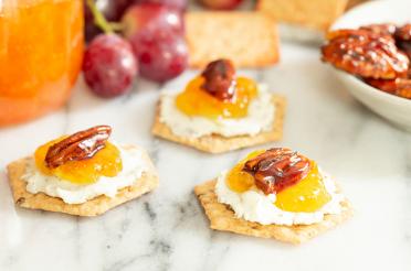 Crackers with jam and cheese