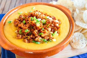 Tex Mex cheese dip with sausage in a bowl