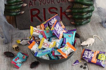 Bowl of candy that's includes organic, fair trade and non-GMO ingredients
