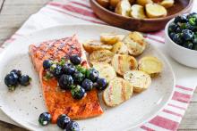 Grilled salmon topped with blueberry salsa