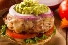 Turkey burger with cheese and guacamole